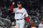 NEW YORK - MAY 05:  Josh Beckett #19 of the Boston Red Sox celebrates the final out of the sixth inning against the New York Yankees on May 5, 2009 at Yankee Stadium in the Bronx borough of New York City. The Red Sox defeated the Yankees 7-3.  (Photo by Jim McIsaac/Getty Images)