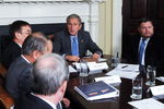 WASHINGTON - OCTOBER 15:  U.S. President George W. Bush (2nd R) speaks after a video teleconference with Iraq Provincial Reconstruction Team Leaders and Brigade Combat Commanders in the Roosevelt Room of the White House on October 15, 2008 in Washington, DC.  (Photo by Roger L. Wollenberg-Pool/Getty Images)