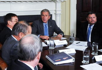 WASHINGTON - OCTOBER 15:  U.S. President George W. Bush (2nd R) speaks after a video teleconference with Iraq Provincial Reconstruction Team Leaders and Brigade Combat Commanders in the Roosevelt Room of the White House on October 15, 2008 in Washington, DC.  (Photo by Roger L. Wollenberg-Pool/Getty Images)