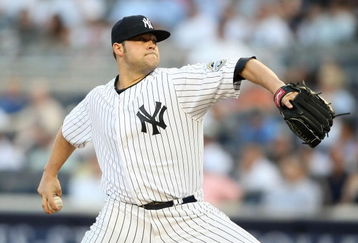 NEW YORK - MAY 21: Joba Chamberlain #62 of the New York Yankees pitches against the Baltimore Orioles on May 21, 2009 at Yankee Stadium in the Bronx borough of New York City.  (Photo by Nick Laham/Getty Images)
