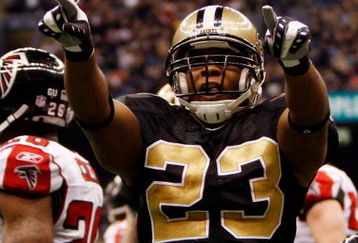 NEW ORLEANS - DECEMBER 07:  Pierre Thomas #23 of the New Orleans Saints celebrate after scoring a touchdown against the Atlanta Falcons on December 7, 2008 at the Superdome in New Orleans, Louisiana.   The Saints defeated the Falcons 29-25.   (Photo by Chris Graythen/Getty Images)