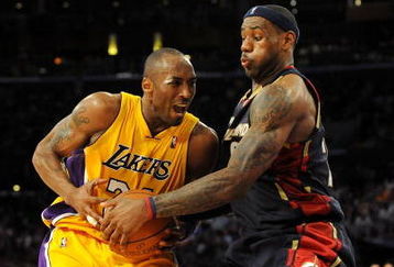LOS ANGELES, CA - JANUARY 19:  LeBron James #23 of the Cleveland Cavaliers attempts to steal the ball from Kobe Bryant #24 of the Los Angeles Lakers during the forth quarter at Staples Center on January 19, 2009 in Los Angeles, California.  (Photo by Harry How/Getty Images)
