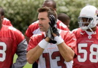 TEMPE, AZ - MAY 2 :  Kurt Warner #13 of the Arizona Cardinals is presented with his 2009 Pro Bowl jersey during a team minicamp at the team training facility on May 2, 2009 in Tempe, Arizona.  (Photo by Jonathan Willey/Getty Images)