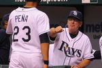 ST. PETERSBURG, FL - APRIL 30: Manager Joe Maddon #70 of  the Tampa Bay Rays celebrates a run against the Boston Red Sox April 30, 2009 at Tropicana Field in St. Petersburg, Florida.  (Photo by Al Messerschmidt/Getty Images)
