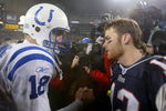 FOXBORO, MA - JANUARY 18:  Quarterback Tom Brady #12 of the New England Patriots and quarterback Peyton Manning #18 of the Indianapolis Colts greet each other on the field after the AFC Championship Game on January 18, 2004 at Gillette Stadium in Foxboro, Massachusetts. The Patriots defeated the Colts 24-14 to advance to the Super Bowl.  (Photo by Ezra Shaw/Getty Images)