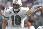 MIAMI, FL - JANUARY 4:  Quarterback Chad Pennington #10 of the Miami Dolphins directs play against the Baltimore Ravens in an NFL Wildcard Playoff Game at Dolphins Stadium on January 4, 2009 in Miami, Florida.  (Photo by Al Messerschmidt/Getty Images) 