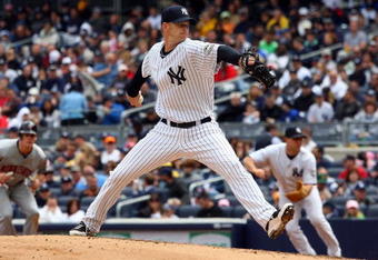 NEW YORK - MAY 17:  A.J. Burnett #34 of the New York Yankees pitches against the Minnesota Twins on May 17, 2009 at Yankee Stadium in the Bronx borough of New York City. The Yankees defeated the Twins 3-2 in ten innings.  (Photo by Jim McIsaac/Getty Images)