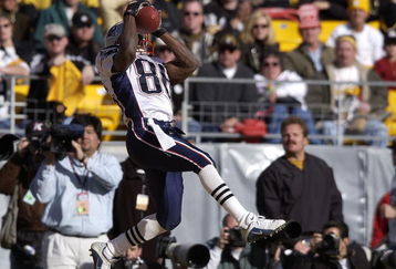 27 Jan 2002:  David Patten #86 of the New England Patriots catches a pass in the endzone to give the Patriots a 14-3 lead during the first half of the AFC  Championship Game between the Pittsburgh Steelers and the New England Patriots at Heinz Field in Pittsburgh, Pennsylvania.  Digital Image Mandatory Credit: Ezra Shaw/Getty Images