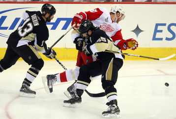 PITTSBURGH - JUNE 02:  Sergei Gonchar #55 and Bill Guerin #13 of the Pittsburgh Penguins skate against Marian Hossa #81 of the Detroit Red Wings during Game Three of the 2009 NHL Stanley Cup Finals on June 2, 2009 at Mellon Arena in Pittsburgh, Pennsylvania.  (Photo by Jim McIsaac/Getty Images)