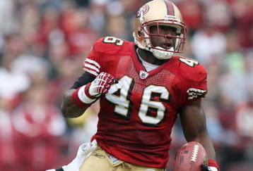 SAN FRANCISCO - DECEMBER 07:  Delanie Walker #46 of the San Francisco 49ers carries the ball against the New York Jets during an NFL game on December 7, 2008 at Candlestick Park in San Francisco, California. (Photo by Jed Jacobsohn/Getty Images)