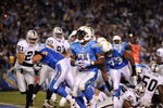 SAN DIEGO - DECEMBER 04:  Running Back LaDainian Tomlinson #21 of the San Diego Chargers rushes for the first touchdown of the game against the Oakland Raiders during their NFL Game on December 4, 2008 at Qualcomm Stadium in San Diego, California.  (Photo by Harry How/Getty Images)