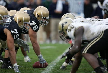 SOUTH BEND, IN - SEPTEMBER 30: Center John Sullivan #78 of the Notre Dame Fighting Irish readies to snap the ball against the Purdue Boilermakers September 30, 2006 at Notre Dame Stadium in South Bend, Indiana. Notre Dame won 35-21. (Photo by Jonathan Daniel/Getty Images)