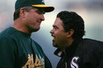 OAKLAND, CA - APRIL 9:  Manager of the Chicago White Sox Ozzie Guillen jokes with the Manager of the Oakland Athletics Bob Geren on the A's opening day at McAfee Coliseum April 9, 2007 in Oakland, California.  (Photo by Jed Jacobsohn/Getty Images)