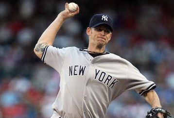 ARLINGTON, TX - MAY 27:  Pitcher A.J. Burnett  #34 of the New York Yankees throws against the Texas Rangers in the first inning on May 27, 2009 at Rangers Ballpark in Arlington, Texas.  (Photo by Ronald Martinez/Getty Images)