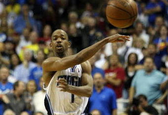 ORLANDO, FL - MAY 26:  Rafer Alston #1 of the Orlando Magic passes the ball against the Cleveland Cavaliers in Game Four of the Eastern Conference Finals during the 2009 NBA Playoffs at the Amway Arena on May 26, 2009 in Orlando, Florida. NOTE TO USER: User expressly acknowledges and agrees that, by downloading and or using this photograph, User is consenting to the terms and conditions of the Getty Images License Agreement.  (Photo by Elsa/Getty Images)