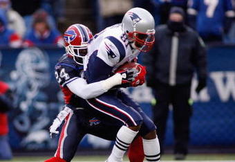 ORCHARD PARK, NY - DECEMBER 28:  Terrence McGee #24 of the Buffalo Bills tackles Randy Moss #81 of the New England Patriots on December 28, 2008 at Ralph Wilson Stadium in Orchard Park, New York. (Photo by Rick Stewart/Getty Images)