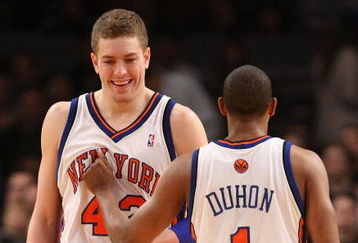 NEW YORK - MARCH 07: David Lee #42 and Chris Duhon #1 of the New York Knicks before the game against the Charlotte Bobcats on March 7, 2009 at Madison Square Garden in New York City. NOTE TO USER: User expressly acknowledges and agrees that, by downloading and or using this photograph, User is consenting to the terms and conditions of the Getty Images License Agreement.  (Photo by Nick Laham/Getty Images)