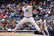 NEW YORK - MAY 17:  A.J. Burnett #34 of the New York Yankees pitches against the Minnesota Twins on May 17, 2009 at Yankee Stadium in the Bronx borough of New York City. The Yankees defeated the Twins 3-2 in ten innings.  (Photo by Jim McIsaac/Getty Images)