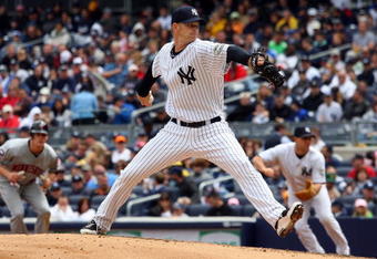 NEW YORK - MAY 17:  A.J. Burnett #34 of the New York Yankees pitches against the Minnesota Twins on May 17, 2009 at Yankee Stadium in the Bronx borough of New York City. The Yankees defeated the Twins 3-2 in ten innings.  (Photo by Jim McIsaac/Getty Images)