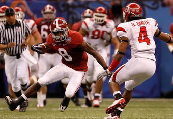 NEW ORLEANS - JANUARY 02:  Wide receiver Julio Jones #8 of the Alabama Crimson Tide looks to make a move on Sean Smith #4 of the Utah Utes after making a catch in the second quarter during the 75th Allstate Sugar Bowl at the Louisiana Superdome on January 2, 2009 in New Orleans, Louisiana.  (Photo by Chris Graythen/Getty Images)