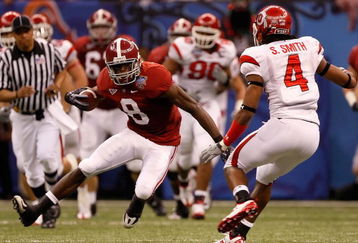 NEW ORLEANS - JANUARY 02:  Wide receiver Julio Jones #8 of the Alabama Crimson Tide looks to make a move on Sean Smith #4 of the Utah Utes after making a catch in the second quarter during the 75th Allstate Sugar Bowl at the Louisiana Superdome on January 2, 2009 in New Orleans, Louisiana.  (Photo by Chris Graythen/Getty Images)