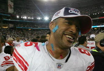 GLENDALE, AZ - FEBRUARY 03:  Wide receiver David Tyree #85 of the New York Giants reacts after the Giants defeated the New England Patriots 17-14 during Super Bowl XLII on February 3, 2008 at the University of Phoenix Stadium in Glendale, Arizona.  (Photo by Streeter Lecka/Getty Images)