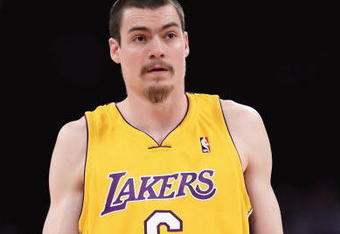 LOS ANGELES, CA - FEBRUARY 26:  Adam Morrison #6 of the Los Angeles Lakers walks on the court during the NBA game against the Phoenix Suns at Staples Center on February 26, 2009 in Los Angeles, California.  The Lakers defeated the Suns 132-106.  NOTE TO USER: User expressly acknowledges and agrees that, by downloading and or using this Photograph, user is consenting to the terms and conditions of the Getty Images License Agreement.  (Photo by Christian Petersen/Getty Images)