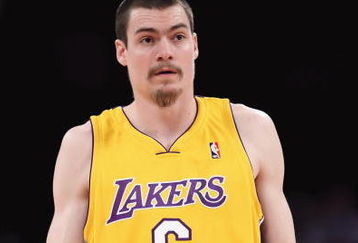 LOS ANGELES, CA - FEBRUARY 26:  Adam Morrison #6 of the Los Angeles Lakers walks on the court during the NBA game against the Phoenix Suns at Staples Center on February 26, 2009 in Los Angeles, California.  The Lakers defeated the Suns 132-106.  NOTE TO USER: User expressly acknowledges and agrees that, by downloading and or using this Photograph, user is consenting to the terms and conditions of the Getty Images License Agreement.  (Photo by Christian Petersen/Getty Images)