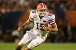 MIAMI - JANUARY 08:  Tim Tebow #15 of the Florida Gators runs the ball against the Oklahoma Sooners during the FedEx BCS National Championship game at Dolphin Stadium on January 8, 2009 in Miami, Florida.  (Photo by Doug Benc/Getty Images)