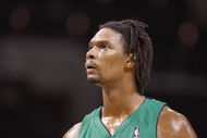 CHARLOTTE, NC - MARCH 16:  Chris Bosh #4 of the Toronto Raptors looks on against the Charlotte Bobcats during their game at Time Warner Cable Arena on March 16, 2009 in Charlotte, North Carolina.  NOTE TO USER: User expressly acknowledges and agrees that, by downloading and/or using this Photograph, user is consenting to the terms and conditions of the Getty Images License Agreement. (Photo by: Streeter Lecka/Getty Images)