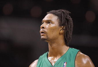 CHARLOTTE, NC - MARCH 16:  Chris Bosh #4 of the Toronto Raptors looks on against the Charlotte Bobcats during their game at Time Warner Cable Arena on March 16, 2009 in Charlotte, North Carolina.  NOTE TO USER: User expressly acknowledges and agrees that, by downloading and/or using this Photograph, user is consenting to the terms and conditions of the Getty Images License Agreement. (Photo by: Streeter Lecka/Getty Images)