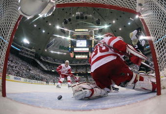 PITTSBURGH - JUNE 04:  Jordan Staal #11 of the Pittsburgh Penguins celebrates after scoring a goal in the second period against goaltender Chris Osgood #30 of the Detroit Red Wings during Game Four of the 2009 NHL Stanley Cup Finals on June 4, 2009 at Mellon Arena in Pittsburgh, Pennsylvania.  (Photo by Bruce Bennett/Getty Images)