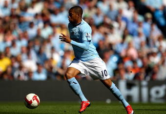 MANCHESTER, ENGLAND - MAY 24:  Robinho makes a break during the Barclays Premier League match between Manchester City and Bolton Wanderers at the City of Manchester Stadium on May 24, 2009 in Manchester, England.  (Photo by Richard Heathcote/Getty Images)