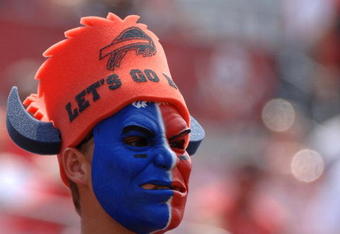 Buffalo Bills fan dressed in team colors watches play   against the Tampa Bay Buccaneers in the second quarter   September 18, 2005 in Tampa.  (Photo by Al Messerschmidt/Getty Images)