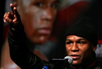 LAS VEGAS - MAY 02:  Boxer Floyd Mayweather Jr. answers questions during a news conference announcing his return to the ring and his upcoming fight against Juan Manuel Marquez of Mexico on July 18 during the news conference at the Hollywood Theatre in the MGM Grand Hotel/Casino May 2, 2009 in Las Vegas, Nevada. Mayweather has not boxed since his bout against Ricky Hatton of England in December 2007.  (Photo by Al Bello/Getty Images)