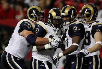 ATLANTA - DECEMBER 28:  Running back Steven Jackson #39 of the St. Louis Rams is congratulated by tackle Adam Goldberg #73, wide receivers Donnie Avery #17 and Dane Looker #89 after Jackson scored against the Atlanta Falcons at Georgia Dome on December 28, 2008 in Atlanta, Georgia.  (Photo by Doug Benc/Getty Images)