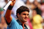 PARIS - JUNE 03:  Roger Federer of Switzerland celebrates victory during the Men's Singles Quarter Final match against Gael Monfils of France on day eleven of the French Open at Roland Garros on June 3, 2009 in Paris, France.  (Photo by Ryan Pierse/Getty Images)
