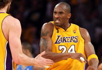 LOS ANGELES, CA - JUNE 04:  Kobe Bryant #24 of the Los Angeles Lakers reacts in the second half with teammate Pau Gasol #16 against the Orlando Magic in Game One of the 2009 NBA Finals at Staples Center on June 4, 2009 in Los Angeles, California. NOTE TO USER: User expressly acknowledges and agrees that, by downloading and or using this photograph, User is consenting to the terms and conditions of the Getty Images License Agreement.  (Photo by Jed Jacobsohn/Getty Images)