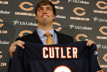 LAKE FOREST, IL - APRIL 3: Quarterback Jay Cutler of the Chicago Bears holds up his #6 jersey after he was introduced as their new quarterback during a press conference on April 3, 2009 at Halas Hall in Lake Forest, Illinois. (Photo by Jim Prisching/Getty Images)