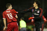 ABERDEEN, UNITED KINGDOM - FEBRUARY 14:  Lee Mair of Aberdeen is pushed by Luca Toni of Bayern Munich during the UEFA Cup round of 32, 1st leg match at Pittodrie stadium February 14, 2008 in Aberdeen, Scotland.  (Photo by Jeff J Mitchell/Getty Images)