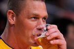 LOS ANGELES, CA - MAY 21:  WWE wrestler John Cena attends Game Two of the Western Conference Finals during the 2009 NBA Playoffs between the Los Angeles Lakers and the Denver Nuggets at Staples Center on May 21, 2009 in Los Angeles, California. NOTE TO USER: User expressly acknowledges and agrees that, by downloading and or using this photograph, User is consenting to the terms and conditions of the Getty Images License Agreement.  (Photo by Kevork Djansezian/Getty Images)