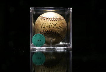 NEW YORK - NOVEMBER 23:   A 1927 baseball autographed by Babe Ruth is seen at a Sotheby's preview of a baseball memorabilia sale titled 'The Babe Comes Home' November 23, 2004 in New York City. The sale will feature important historical baseball relics with items including the bat which Babe Ruth used to hit the first home run in Yankee Stadium. (Photo by Mario Tama/Getty Images)