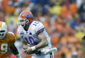 KNOXVILLE, TN - SEPTEMBER 21:  Quarterback Ingle Martin #10 of the Florida Gators runs with the ball during the Southeastern Conference football game against the Tennessee Volunteers on September 21, 2002 at Neyland Stadium in Knoxville, Tennessee.  Florida won 30-13. (Photo by Craig Jones/Getty Images)