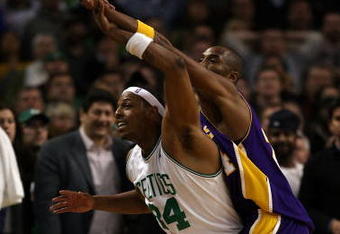 BOSTON - FEBRUARY 05:  Paul Pierce #34 of the Boston Celtics tries to get open as Kobe Bryant #24 of Los Angeles Lakers defends on February 5, 2009 at TD Banknorth Garden in Boston, Massachusetts. The Lakers defeated the Celtics 110-109 in overtime. NOTE TO USER: User expressly acknowledges and agrees that, by downloading and or using this Photograph, user is consenting to the terms and conditions of the Getty Images License Agreement.  (Photo by Elsa/Getty Images)