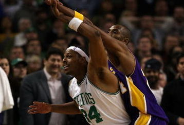 BOSTON - FEBRUARY 05:  Paul Pierce #34 of the Boston Celtics tries to get open as Kobe Bryant #24 of Los Angeles Lakers defends on February 5, 2009 at TD Banknorth Garden in Boston, Massachusetts. The Lakers defeated the Celtics 110-109 in overtime. NOTE TO USER: User expressly acknowledges and agrees that, by downloading and or using this Photograph, user is consenting to the terms and conditions of the Getty Images License Agreement.  (Photo by Elsa/Getty Images)