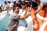 MIAMI - JANUARY 04:  Head coach John Harbaugh of the Baltimore Ravens celebrates a 27-9 AFC Wild Card victory over the Miami Dolphins with fans on January 4, 2009 at Dolphin Stadium in Miami, Florida.  (Photo by Gregory Shamus/Getty Images)