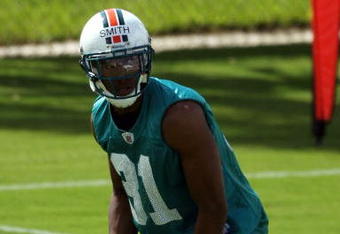 DAVIE, FL - MAY 02:  Rookie cornerback Sean Smith #31 of the Miami Dolphins catches a ball during mini camp on May 2, 2009 at the Miami Dolphins Training facility in Davie, Florida.  (Photo by Marc Serota/Getty Images)