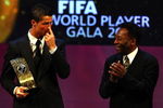 ZURICH, SWITZERLAND - JANUARY 12: Pele applauds as Cristiano Ronaldo of Portugal wins The FIFA World Player Of The Year 2008, at the Zurich Opera House on January 12, 2009 in Zurich, Switzerland.  (Photo by John Gichigi/Getty Images)