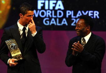 ZURICH, SWITZERLAND - JANUARY 12: Pele applauds as Cristiano Ronaldo of Portugal wins The FIFA World Player Of The Year 2008, at the Zurich Opera House on January 12, 2009 in Zurich, Switzerland.  (Photo by John Gichigi/Getty Images)