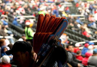 FLUSHING, NY - MARCH 29:  A vendor walks around the stadium selling large fingers during the Georgetown and St. Johns game at Citi Field on March 29, 2009 in the Flushing neighborhood of the Queens borough of New York City. This is the first event to be held at the new Citi Field.  (Photo by Ezra Shaw/Getty Images)